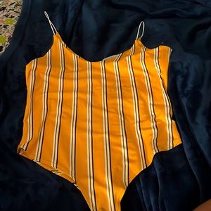 Body sit that’s yellow white and black